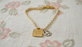 Gold Chain Bracelet with Peace Charms